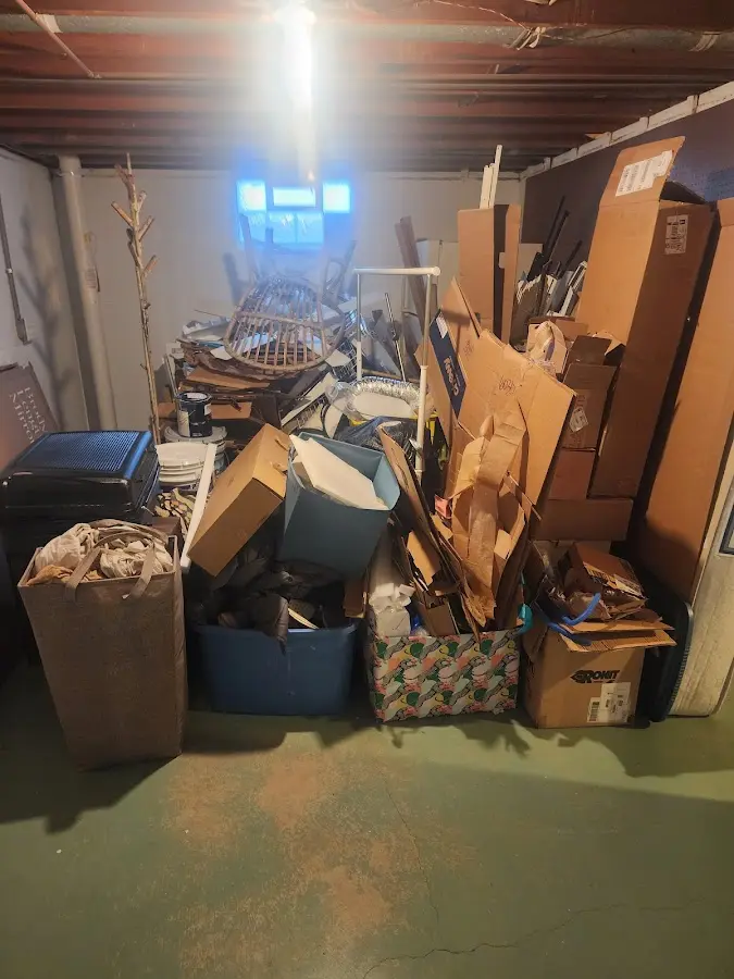 Roll-off dumpster container at job site for Yard Waste Dumpster Rental in McComb